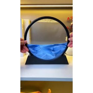 Bedside table with illuminated sand art lamp