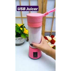Person blending smoothie in portable cup