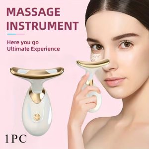 Woman using U-shaped neck massager along jawline