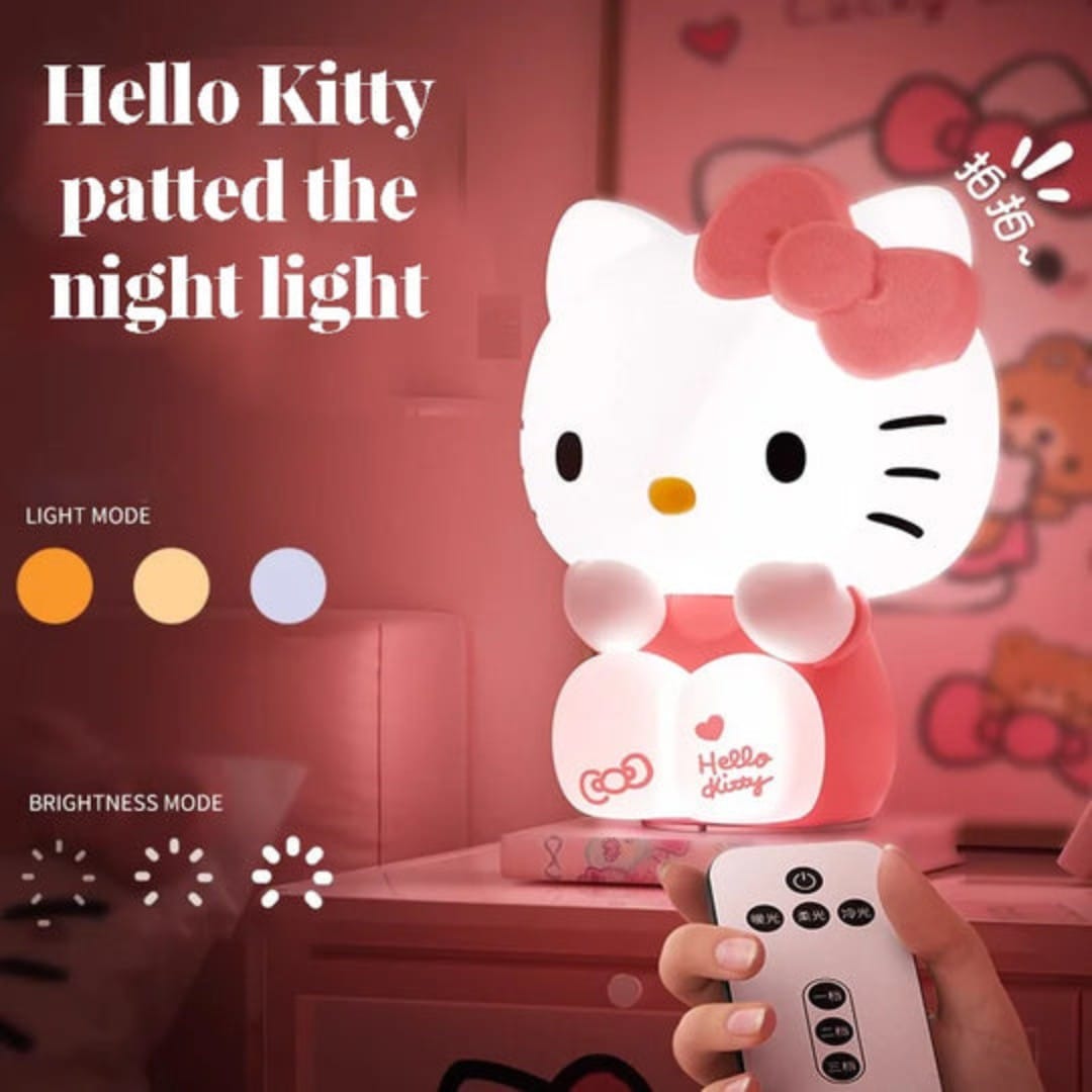 Hello Kitty silicone night light glowing on pink bedside table