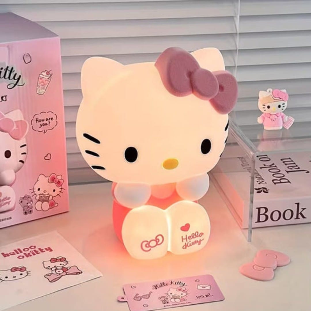 USB rechargeable Hello Kitty bedside lamp emitting soft glow