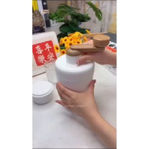 Shaved ice being collected in bowl from crusher