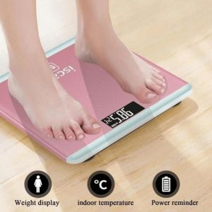 Person standing on slim tempered glass scale